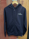 Navy blue jacket with a brand logo on a wooden surface