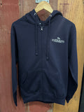 Navy blue jacket with a brand logo on a wooden surface