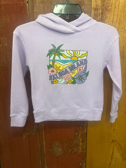 White sweatshirt with a colorful graphic design on a wooden surface