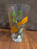 Clear pint glass with a bear and forest design