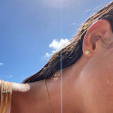 Close-up of a shell-shaped earring