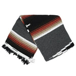 Striped blanket with black, red, and beige pattern