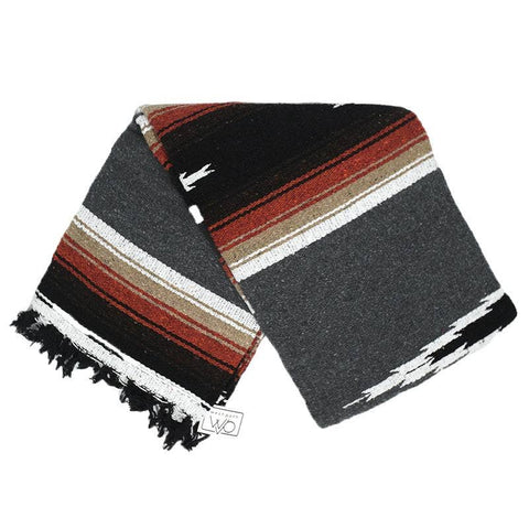 Striped blanket with black, red, and beige pattern