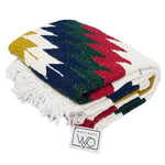 Colorful patterned blanket with fringes