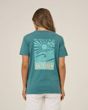 Person wearing a teal t-shirt with a graphic design and 'Salty Crew' text on the back.
