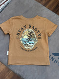 A brown colored t-shirt with a graphic design of a shark and text 'STAY SALTY FOREVER STOKED' on the back.